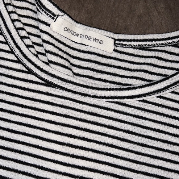 Black and White women’s top caution to the wind - Picture 2 of 4